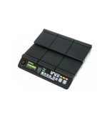 Close-up view of the Yamaha DTX-MULTI 12 electronic percussion pad, featuring 12 velocity-sensitive trigger pads in a compact split-level black design with illuminated controls, USB ports, and audio outputs for drummers and producers.